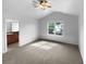 Spacious main bedroom features a large window and ceiling fan at 148 Hill Side Way, Hiram, GA 30141
