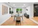Bright and modern dining room featuring a window, bench seating, and contemporary decor at 2781 Long Way, Decatur, GA 30032