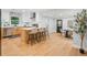 Bright, open kitchen featuring a central island, stainless steel appliances, and sleek white cabinetry at 2781 Long Way, Decatur, GA 30032