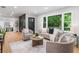Bright living room with lots of light, and modern furniture at 2781 Long Way, Decatur, GA 30032