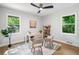 Bright office with a desk, 2 chairs, 2 windows with view and hardwood floors at 2781 Long Way, Decatur, GA 30032