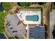Aerial view of the community pool, lounge area, and parking showcasing community ammenities at 4321 Lanier Ridge Walk # 1704, Cumming, GA 30041