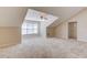Spacious carpeted bedroom featuring a ceiling fan, a large window and neutral paint at 4321 Lanier Ridge Walk # 1704, Cumming, GA 30041