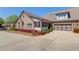 Attractive brick home with a two-car garage, screened in porch and landscaped grounds at 4321 Lanier Ridge Walk # 1704, Cumming, GA 30041