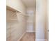 Walk-in closet with wire shelving and neutral carpet at 4321 Lanier Ridge Walk # 1704, Cumming, GA 30041