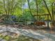 Neighborhood entrance with bench swing that welcomes you into the community at 55 Delmont Ne Dr # D1, Atlanta, GA 30305