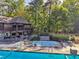 Relaxing community pool with sundeck and plenty of seating on a beautiful summer day at 55 Delmont Ne Dr # D1, Atlanta, GA 30305