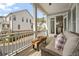 Cozy outdoor balcony with seating area and views of the surrounding neighborhood at 1004 Baldwin Dr, Milton, GA 30009