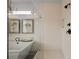 Close up on a bright bathroom featuring a modern shower, free standing tub, and stylish fixtures at 1004 Baldwin Dr, Milton, GA 30009
