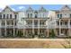 Charming home featuring a double-decker front porch, brick foundation and stylish facade at 1004 Baldwin Dr, Milton, GA 30009
