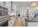 Spacious kitchen featuring an island, modern appliances, and open floor plan at 1004 Baldwin Dr, Milton, GA 30009