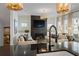Stylish living room with a fireplace, large TV, and comfortable seating area at 1004 Baldwin Dr, Milton, GA 30009