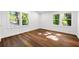 Bedroom featuring hardwood floors, bright windows, and lots of natural light at 1027 Mount Airy Sw Dr, Atlanta, GA 30311