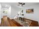Home office featuring hardwood floors, a modern desk and chair, and large windows at 1027 Mount Airy Sw Dr, Atlanta, GA 30311