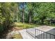 Backyard area featuring a patio and lush greenery providing privacy at 3200 Rehoboth Dr, Decatur, GA 30033