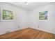 Bright bedroom featuring hardwood floors and two windows offering ample natural light at 3200 Rehoboth Dr, Decatur, GA 30033