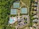Aerial view of neighborhood amenities including pool, tennis court and playground at 5260 Sherwood Way, Cumming, GA 30040