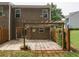 View of the backyard patio with pergola, perfect for outdoor lounging and al fresco dining at 5260 Sherwood Way, Cumming, GA 30040