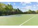 Community basketball court with well-maintained surfaces and equipment for recreational play at 5260 Sherwood Way, Cumming, GA 30040
