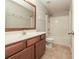 Bathroom featuring a vanity and a shower-tub combination at 5260 Sherwood Way, Cumming, GA 30040