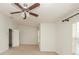 Bedroom with natural light, carpeted floors and ceiling fan at 5260 Sherwood Way, Cumming, GA 30040