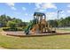 A playground for community residents with slides, climbing structures, and other play equipment at 5260 Sherwood Way, Cumming, GA 30040