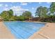 Large community swimming pool with clear blue water and ample deck space for lounging at 5260 Sherwood Way, Cumming, GA 30040