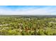 Overhead view of a secluded home, surrounded by mature trees and serene landscapes at 111 Amberwood Ln, Euharlee, GA 30145