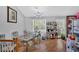Dining room with chandelier, decorative table and hardwood floors at 111 Amberwood Ln, Euharlee, GA 30145