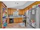 Kitchen featuring modern appliances, stylish backsplash, and ample cabinet space at 111 Amberwood Ln, Euharlee, GA 30145
