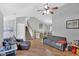 Spacious living room with hardwood floors and staircase access at 111 Amberwood Ln, Euharlee, GA 30145