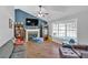 Inviting living room features a cozy fireplace and bright natural light at 111 Amberwood Ln, Euharlee, GA 30145