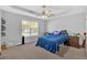 Spacious primary bedroom boasts a ceiling fan and an abundance of natural light at 111 Amberwood Ln, Euharlee, GA 30145