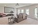 Finished basement with theater screen, windows, and access to the outdoors at 2331 Kinsale Nw Pt, Kennesaw, GA 30152