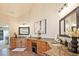 Double vanity in this main bathroom offers granite counters, framed mirrors, and beautiful lighting at 2331 Kinsale Nw Pt, Kennesaw, GA 30152