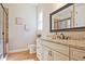 Bathroom featuring a granite countertop, glass shower, and custom cabinets at 2331 Kinsale Nw Pt, Kennesaw, GA 30152