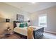 Bright bedroom with a queen-sized bed, neutral walls, and ample natural light at 2331 Kinsale Nw Pt, Kennesaw, GA 30152