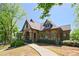 Elegant clubhouse exterior with stone accents and manicured landscaping, offering a luxurious and inviting atmosphere at 2331 Kinsale Nw Pt, Kennesaw, GA 30152