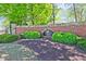 Welcoming community entrance with brick signage and lush landscaping, creating a grand and inviting first impression at 2331 Kinsale Nw Pt, Kennesaw, GA 30152