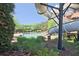 Inviting community pool with water slide and lounge chairs, offering a perfect spot for relaxation and recreation at 2331 Kinsale Nw Pt, Kennesaw, GA 30152