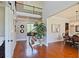 Open foyer with hardwood floors, staircase, and view to the adjacent dining room at 2331 Kinsale Nw Pt, Kennesaw, GA 30152