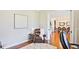 Comfortable office space featuring a leather recliner and view into dining room at 2331 Kinsale Nw Pt, Kennesaw, GA 30152