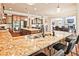 Spacious kitchen features an island, granite countertops, stainless steel appliances, and seating for entertaining at 2331 Kinsale Nw Pt, Kennesaw, GA 30152