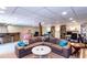 Large finished basement with a bar, seating, and desk area at 3397 Old Jonesboro Rd, Hapeville, GA 30354