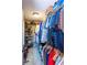 Walk-in closet with ample shelving and hanging storage for clothes and shoes at 3397 Old Jonesboro Rd, Hapeville, GA 30354