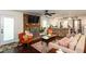 Inviting living room with a stone fireplace and seamless access to the open kitchen at 3397 Old Jonesboro Rd, Hapeville, GA 30354