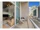 Cozy balcony with seating overlooking a city view and access to the living area at 44 Peachtree Nw Pl # 528, Atlanta, GA 30309
