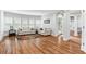 Bright living room boasts hardwood floors, neutral walls, two sofas, and a beautiful area rug at 5422 Heyward Square Pl, Marietta, GA 30068