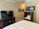 Bedroom featuring a flat screen TV and a comfortable bed at 187 Slate Dr, Buford, GA 30518