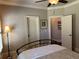 Bedroom featuring a ceiling fan, neutral walls, and a comfortable bed at 187 Slate Dr, Buford, GA 30518